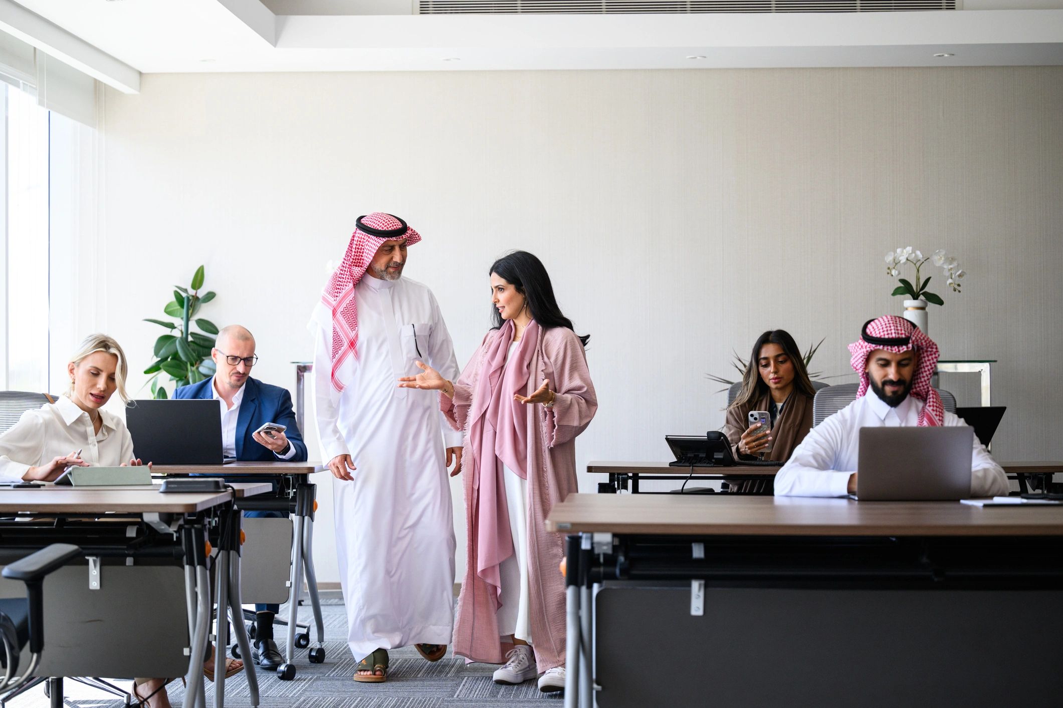 Business team collaborating in a modern global office